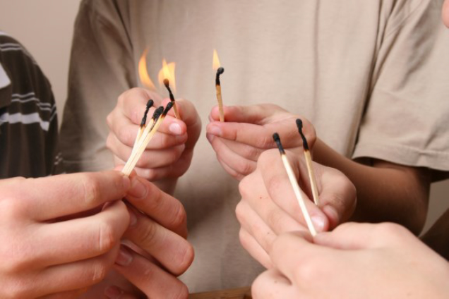 kids lighting matches