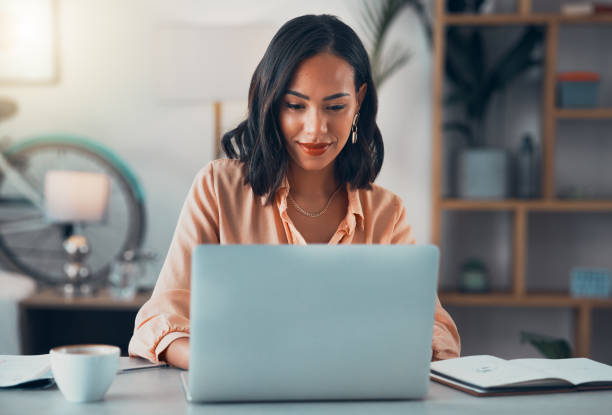 person sitting at laptop